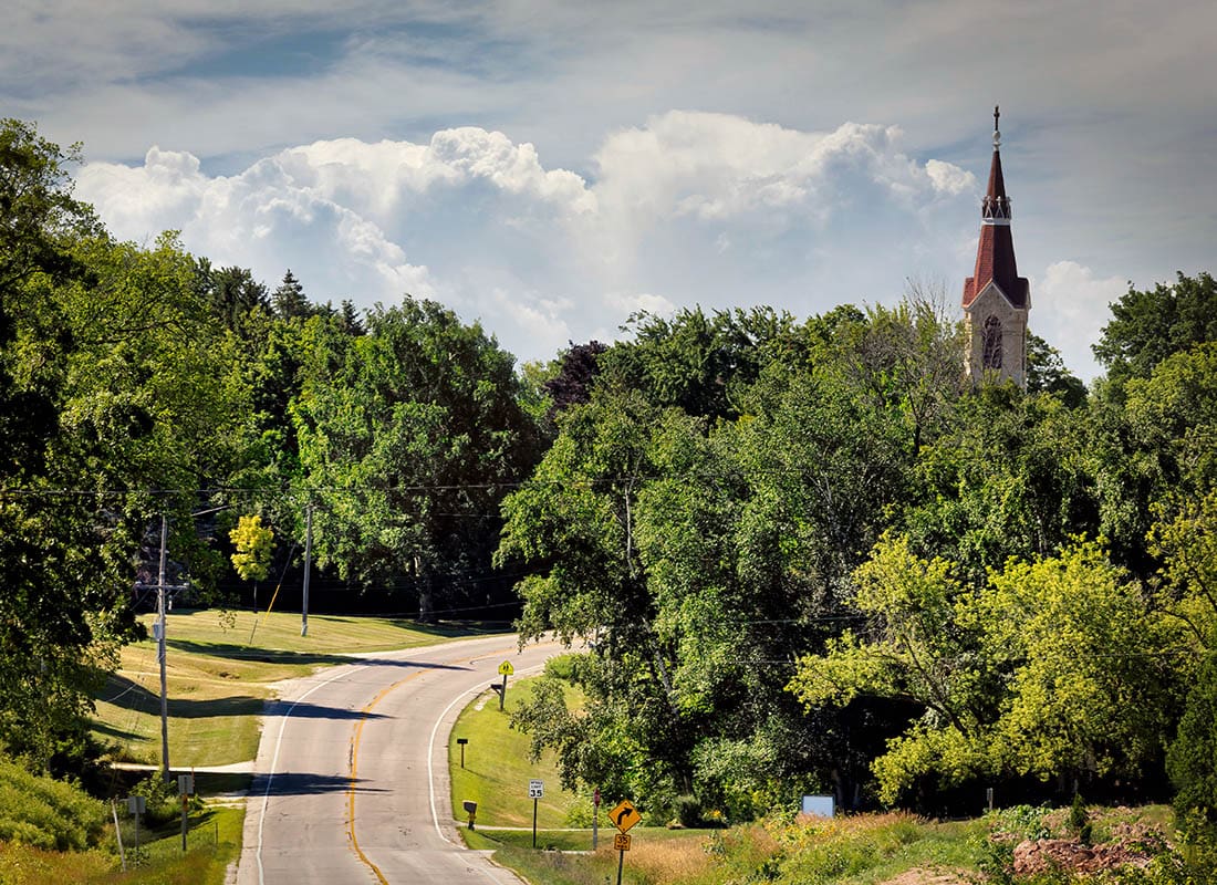 Whitelaw, WI - Aerial View of a Church Area Surrounded by Trees